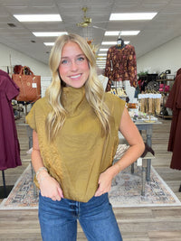 The Nova top - mustard yellow top with a soft metallic sheen, featuring a high neckline, cap sleeves