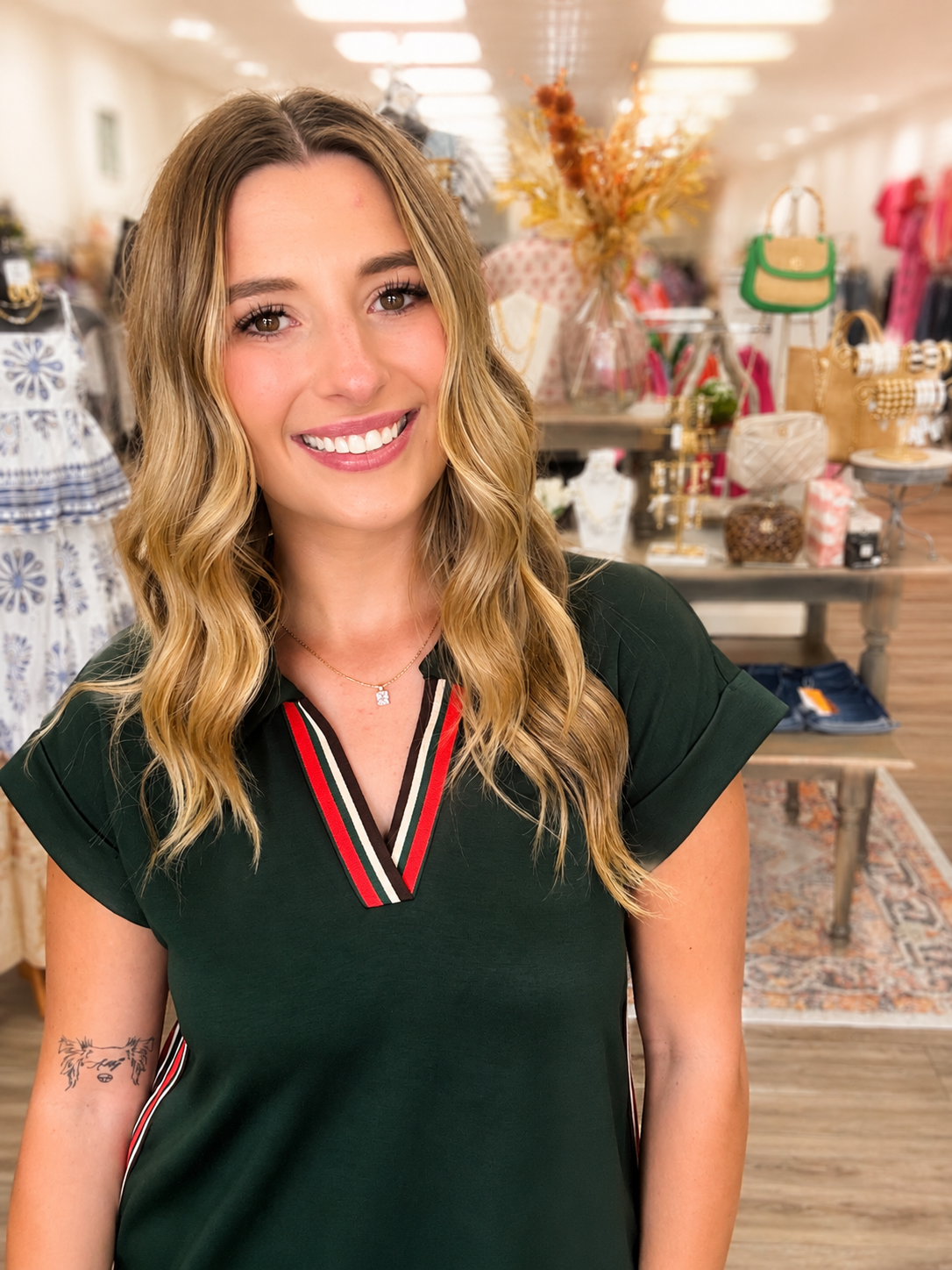 The Evergreen Lane Polo Maxi Dress has a contrasting striped trim detail, collared V-Neckline, cap sleeves with lightweight, comfortable fabric. The best part- it has pockets!