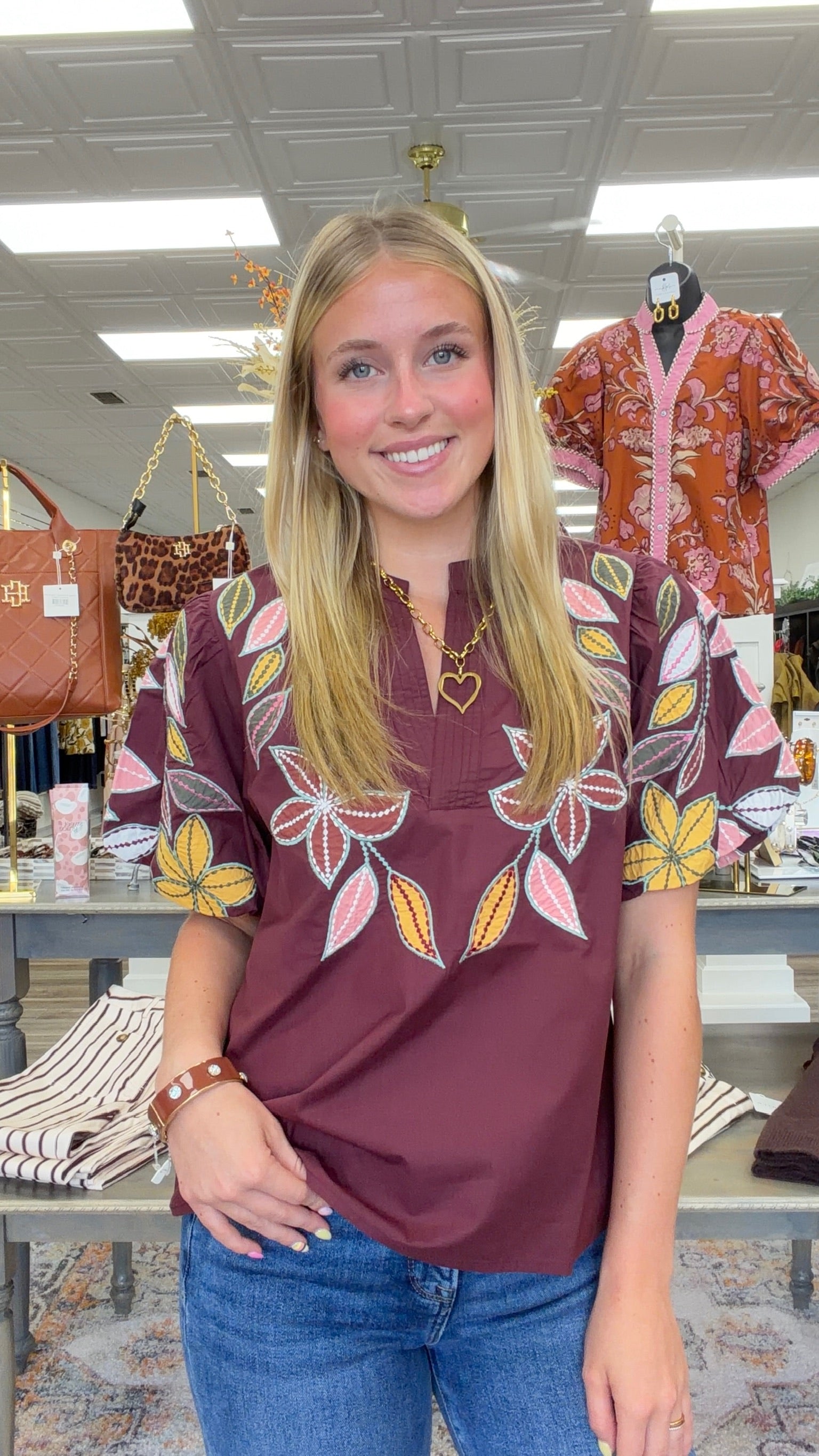 Falling for Florals Top - rich burgundy top featuring colorful floral and leaf embroidery, statement puff sleeves, and a feminine notched neckline