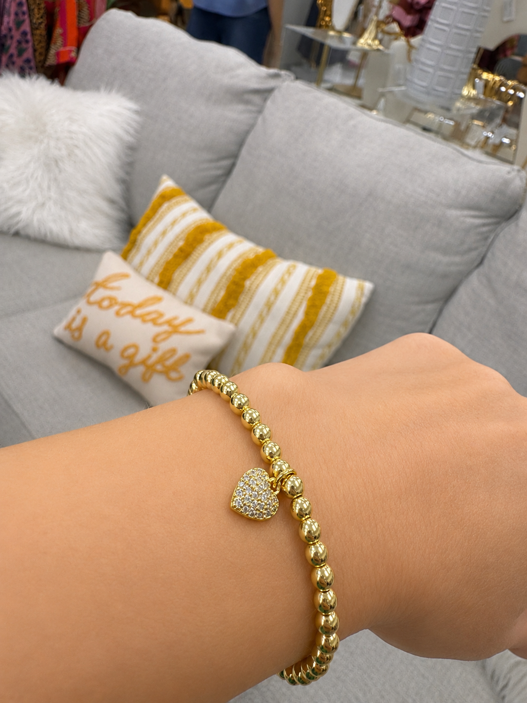 Stretch beaded gold stackable bracelet with cz heart charm accent- steel 18 karat gold overlay