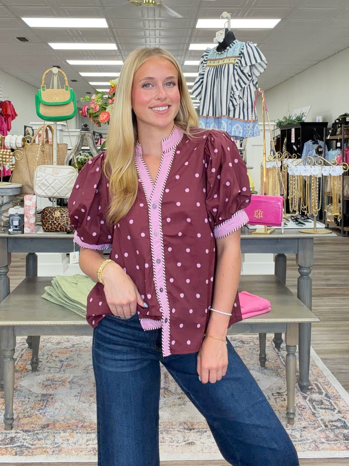 Country Charm Polka Dot Blouse - burgundy polka dots meet soft pink trim. A flattering V-neck adds the perfect finishing touch.
