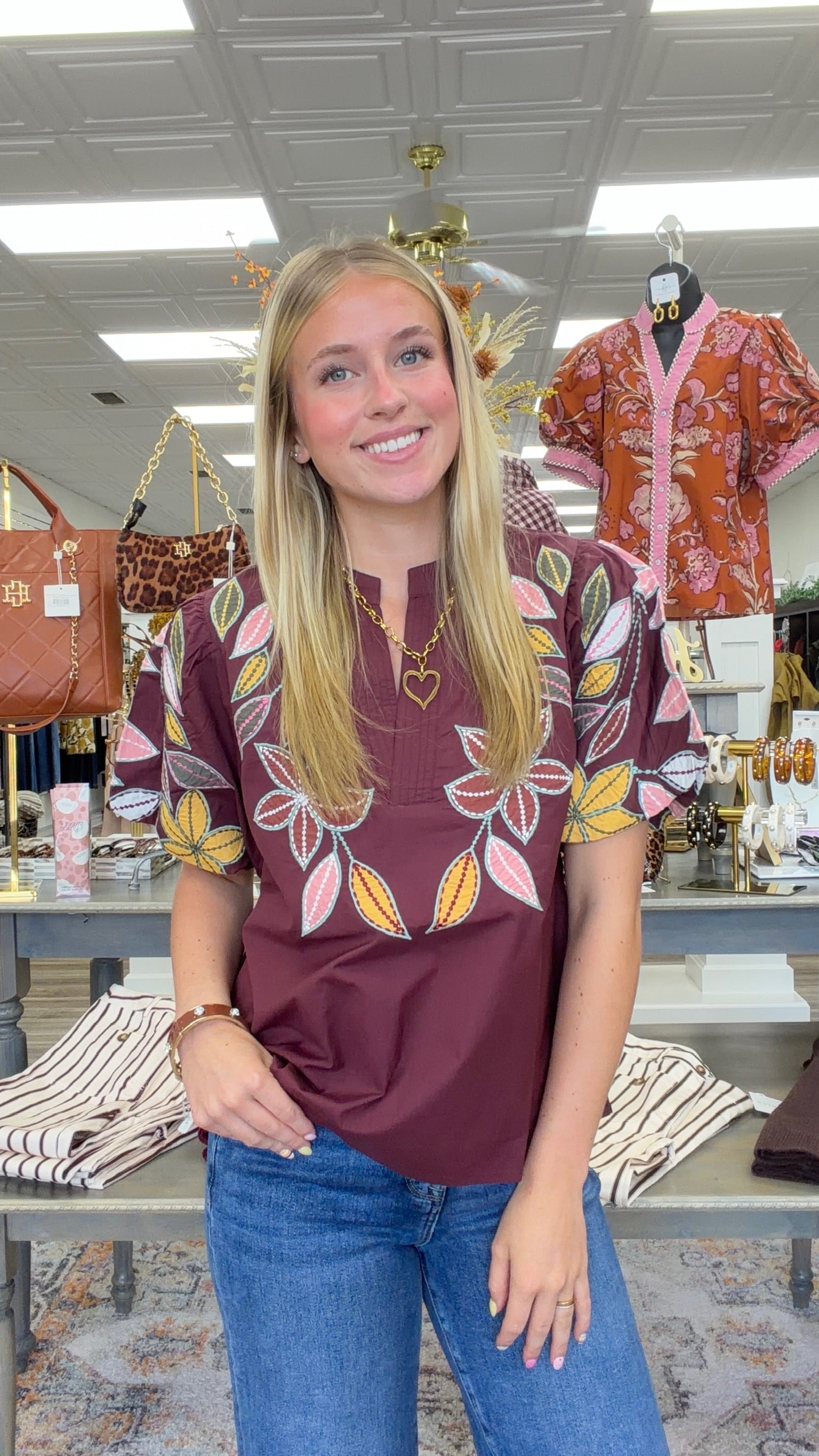 Falling for Florals Top - rich burgundy top featuring colorful floral and leaf embroidery, statement puff sleeves, and a feminine notched neckline