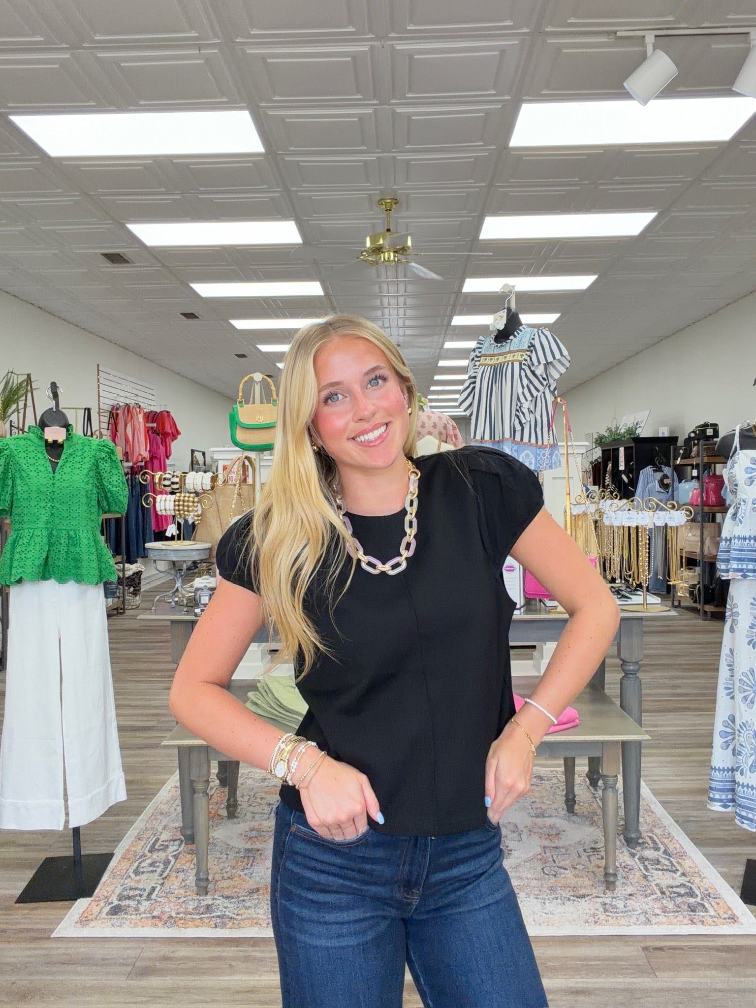 Classic pearl puff top - A soft black knit top featuring a flattering square neckline, puff sleeves