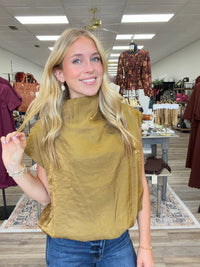 The Nova top - mustard yellow top with a soft metallic sheen, featuring a high neckline, cap sleeves