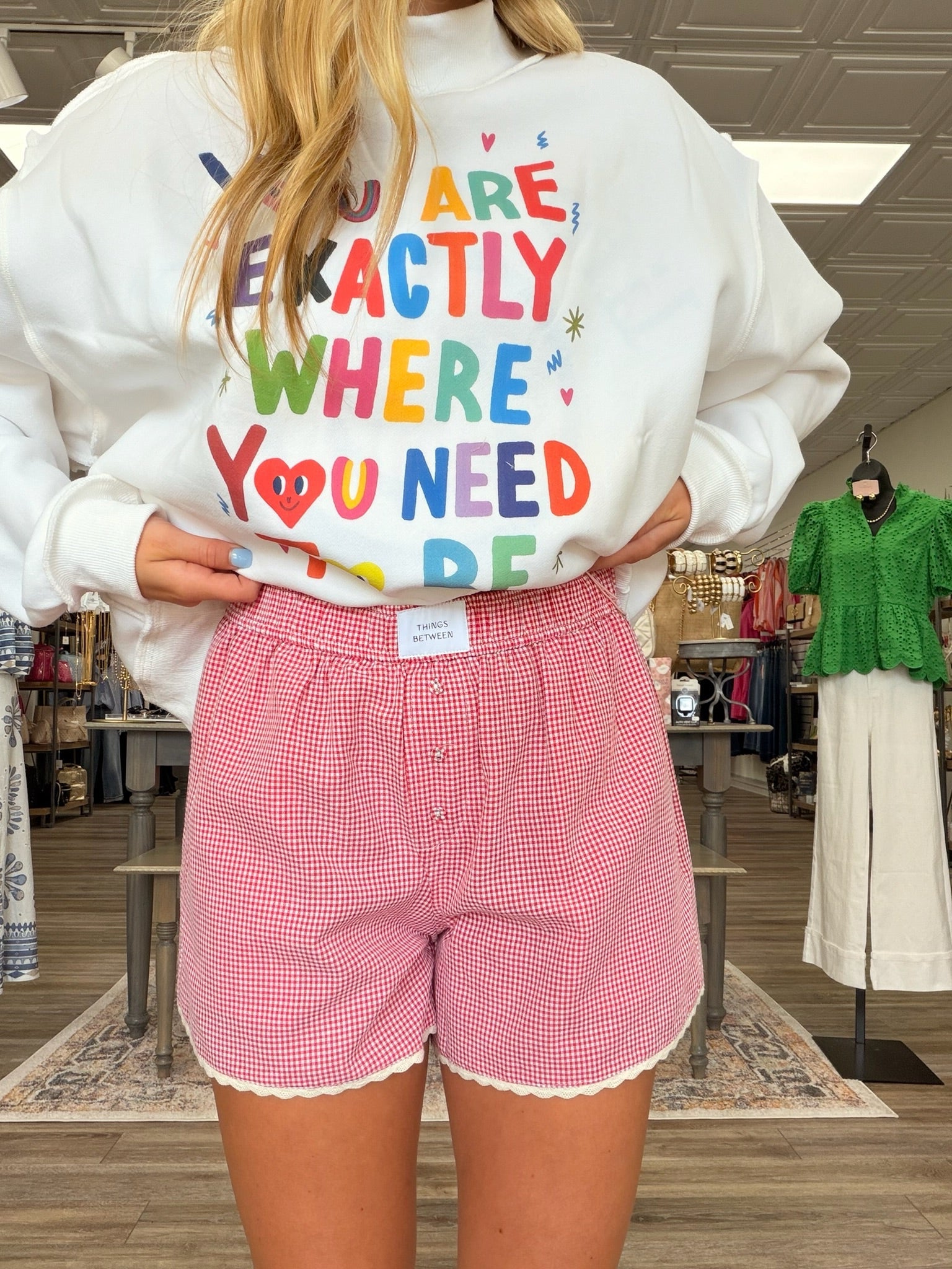 The Annie shorts - Red gingham boxer-style shorts featuring an elastic waist, button-front detail, and sweet scalloped lace trim for a playful, cozy-cute look.