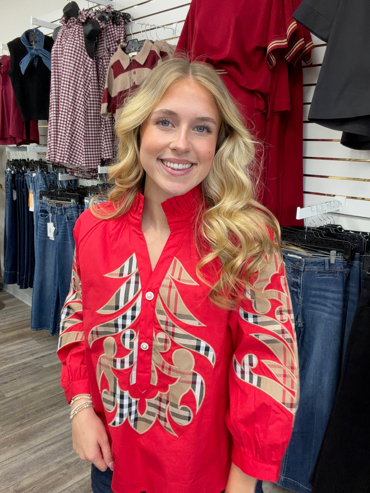 Crimson Plaid Statement Blouse - vibrant red long-sleeve blouse featuring bold plaid appliqué embroidery, a ruffled collar, and button-front detailing