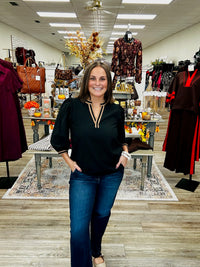 The Blair Top - black blouse featuring puff sleeves and rich camel contrast trim