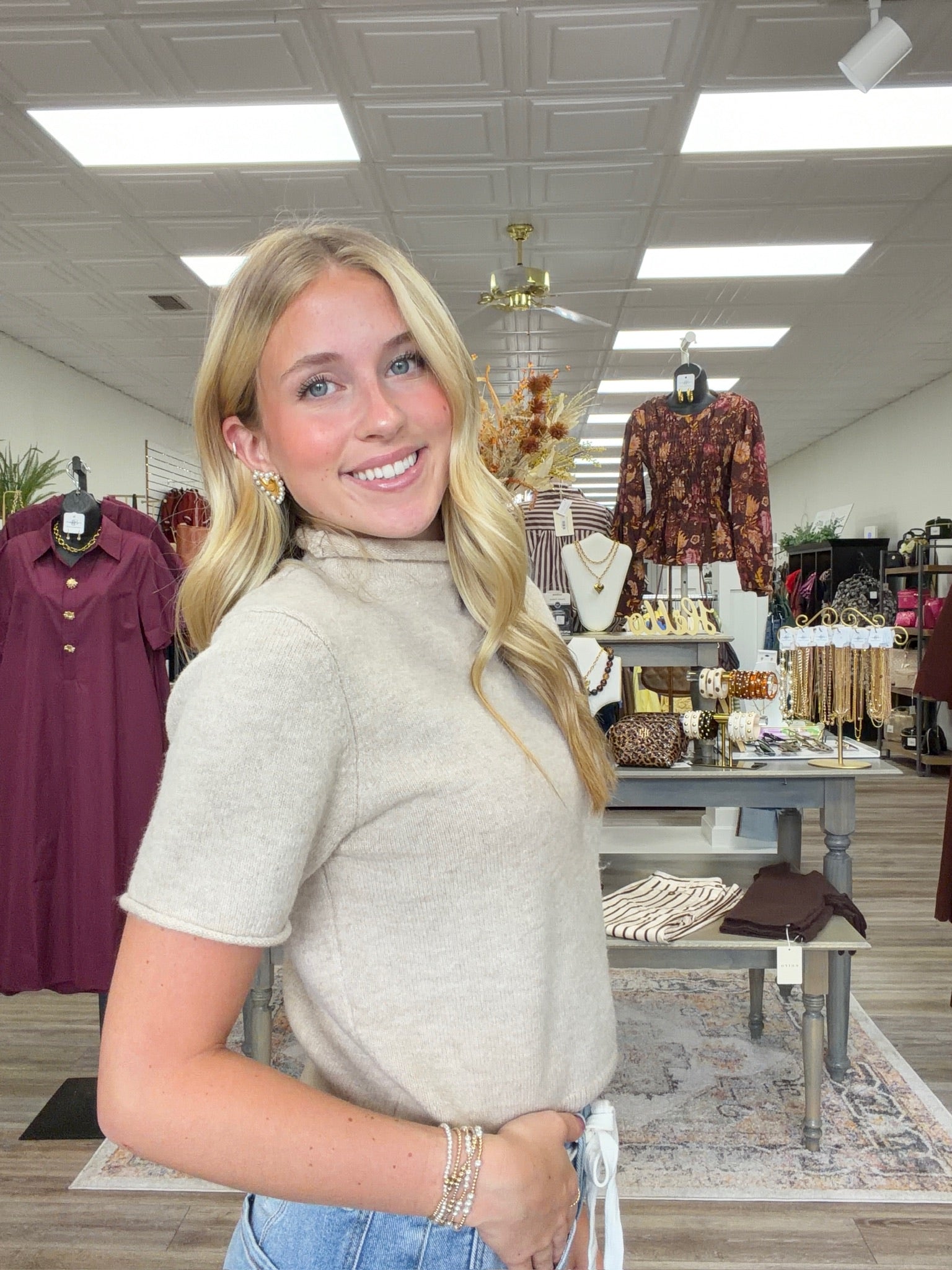 Aspen Cloud Knit Mock Neck Sweater Top – Luxe Soft Short Sleeve Pullover in Oatmeal Cream. Ultra-soft oatmeal knit top featuring a relaxed mock neck, short sleeves, and a flattering ribbed hem
