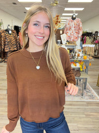 The Morgan sweater - brown knit sweater, exposed seam detailing, dropped shoulders, and ribbed trim at the neckline, cuffs, and hem