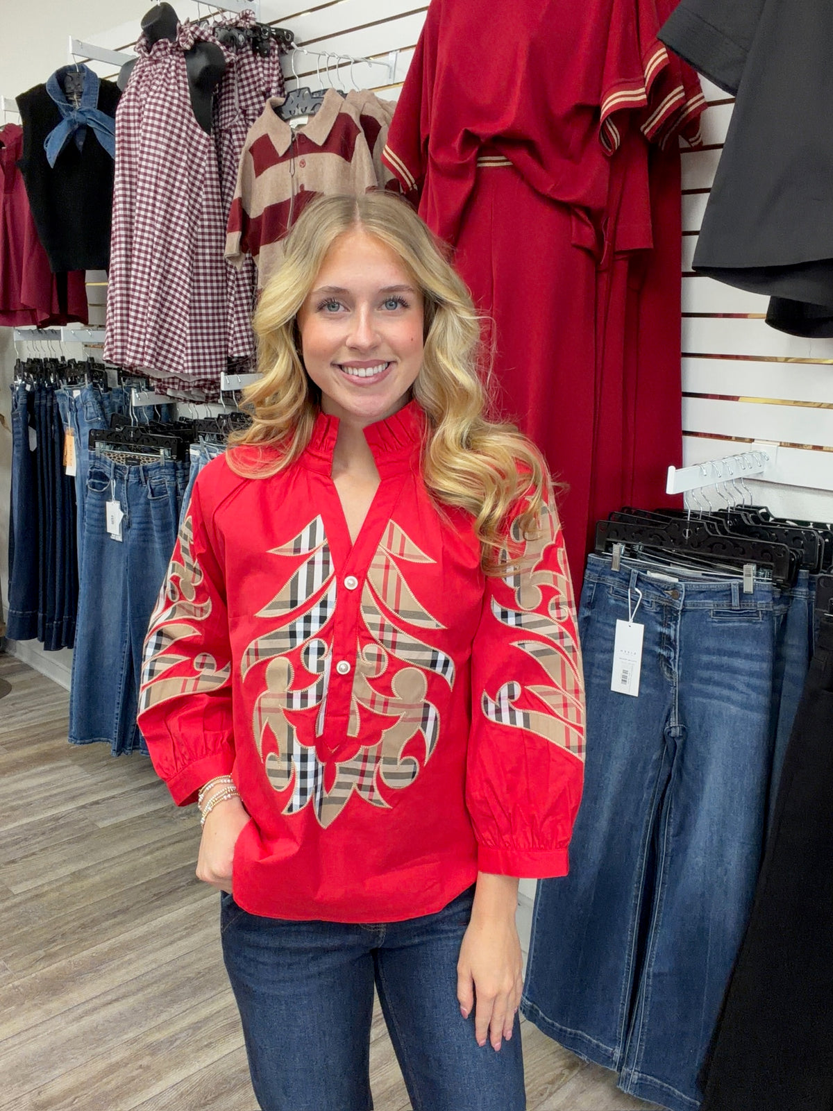 Crimson Plaid Statement Blouse - vibrant red long-sleeve blouse featuring bold plaid appliqué embroidery, a ruffled collar, and button-front detailing
