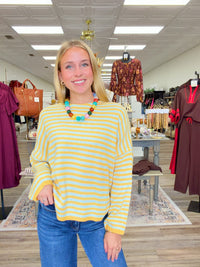 Meet me in stripes sweater - Cozy tangerine and blue striped knit sweater featuring a relaxed fit, classic round neckline