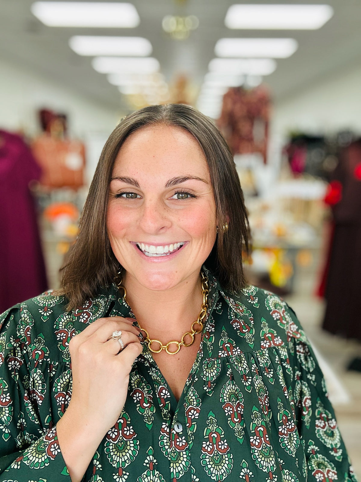 Evergreen Elegance Blouse - rich forest green blouse featuring a vintage-inspired floral print, statement collar, button-front detail, and flowy long sleeves.