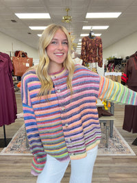 Sunset sorbet cardigan - soft, colorful rainbow-striped knit cardigan featuring a cozy relaxed fit, crew neckline, and button-front closure.