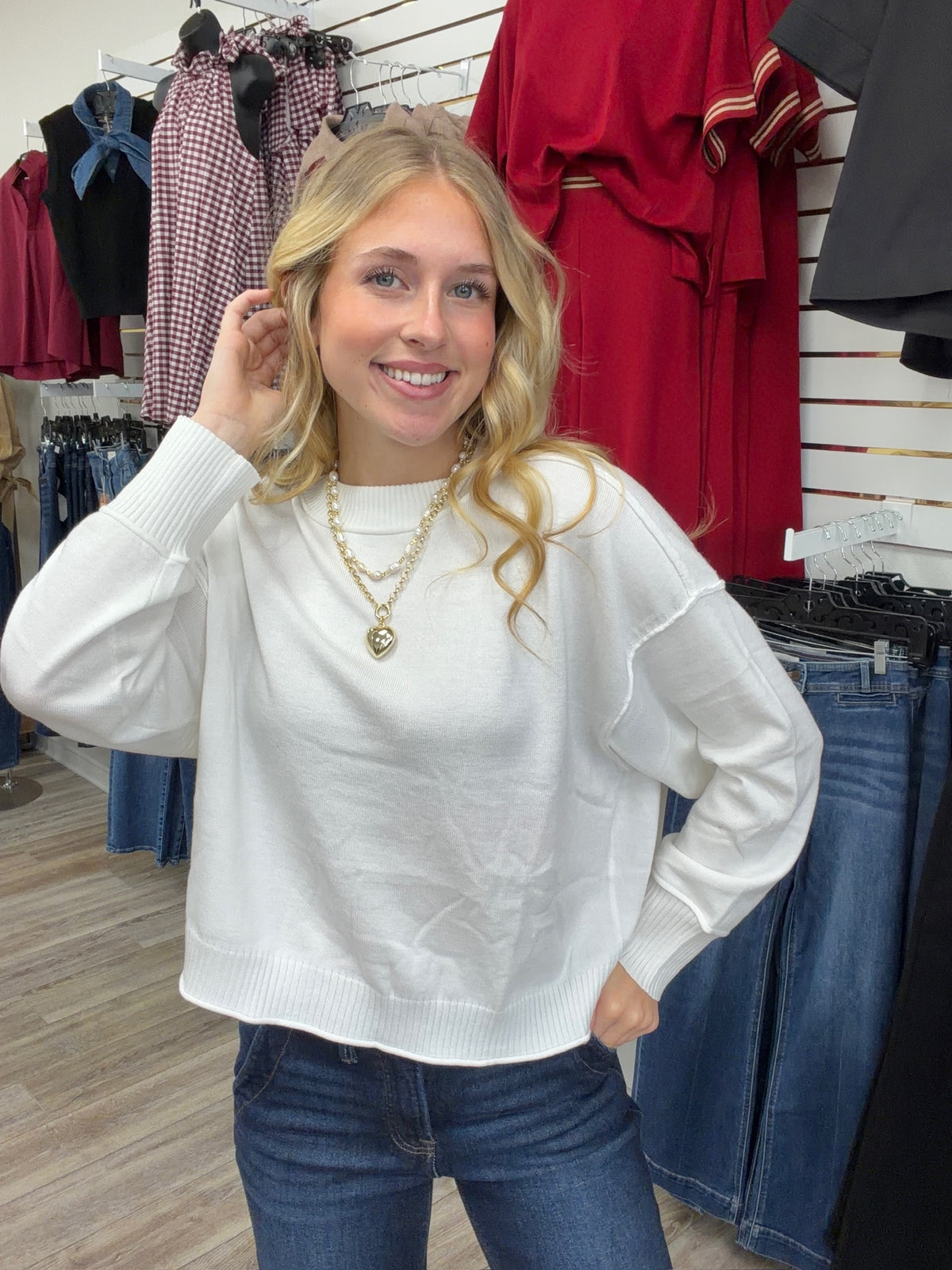 The Morgan sweater - white knit sweater, exposed seam detailing, dropped shoulders, and ribbed trim at the neckline, cuffs, and hem