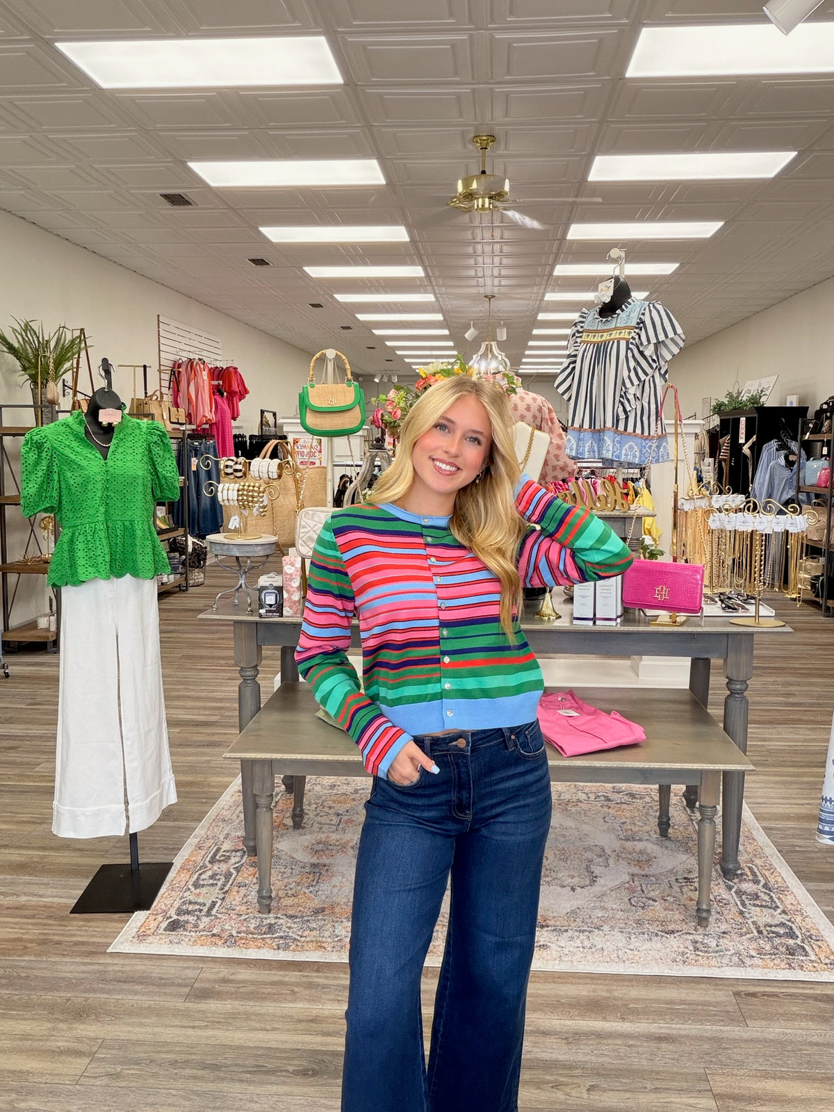 Colorful skies cardigan - A lightweight knit cardigan featuring a colorful striped pattern, a classic crew neckline, and a button-front design with a soft, fitted silhouette.