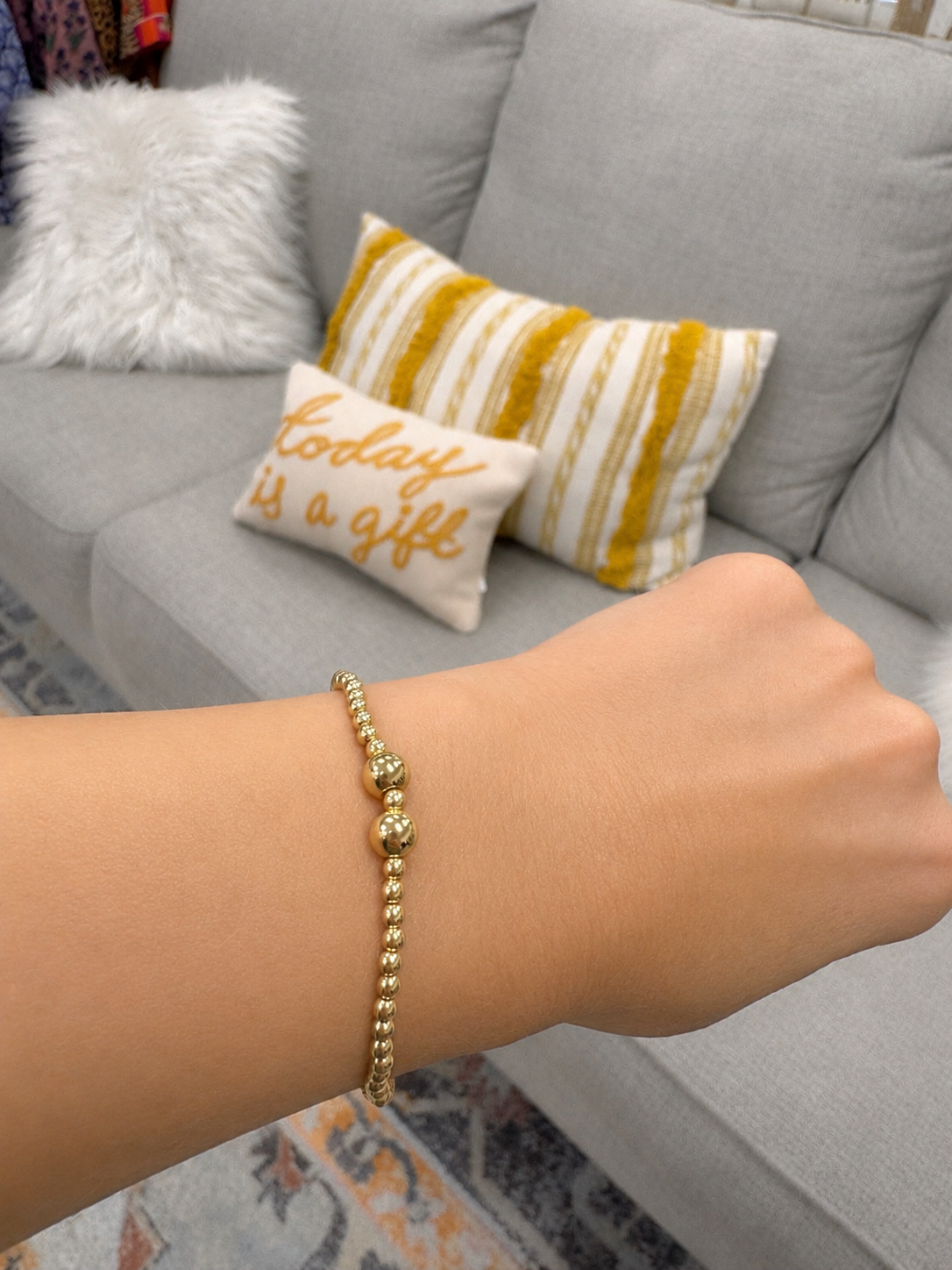 Stretch beaded stackable gold bracelet with small and larger beads– steel 18 karat gold overlay