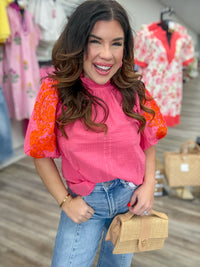 The May top - Faire pink top with orange embroidered on sleeve
