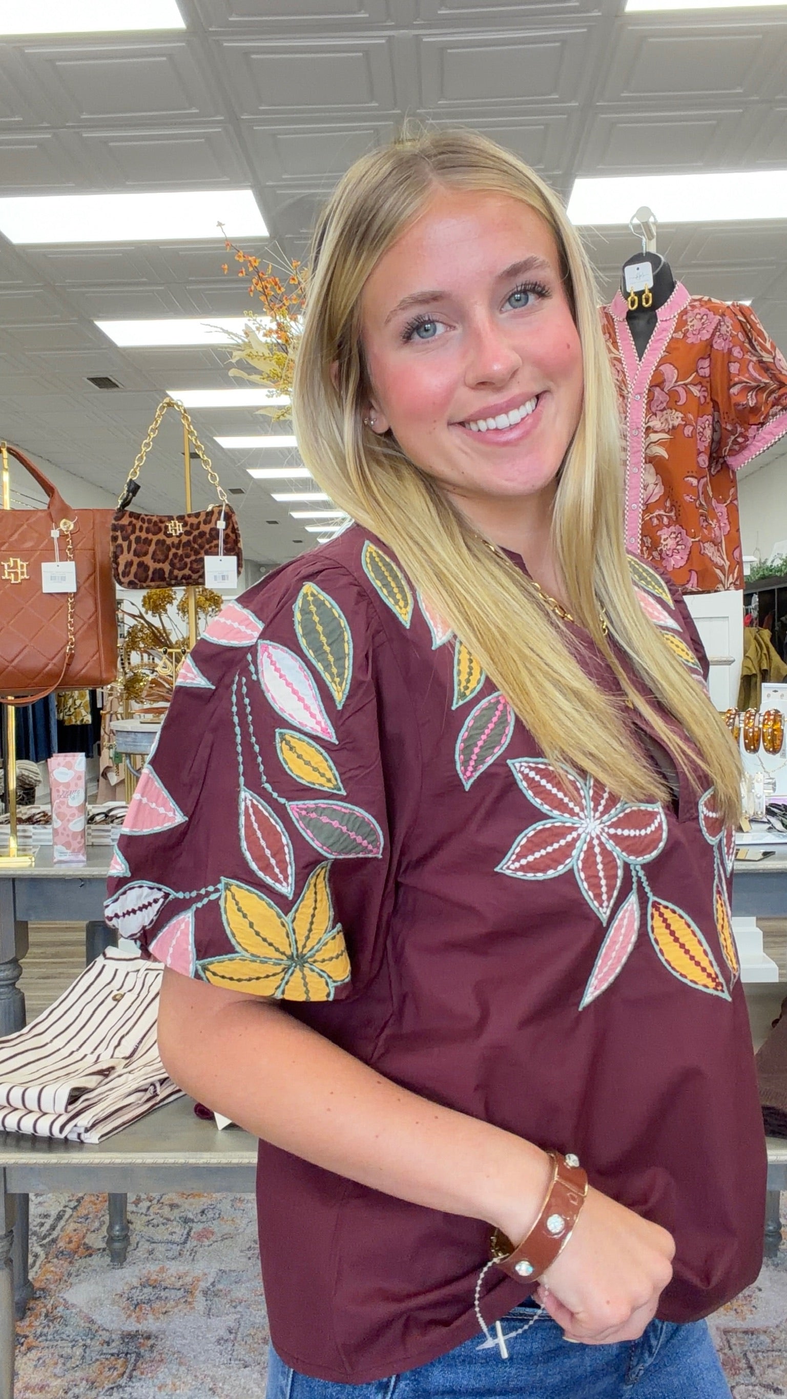 Falling for Florals Top - rich burgundy top featuring colorful floral and leaf embroidery, statement puff sleeves, and a feminine notched neckline