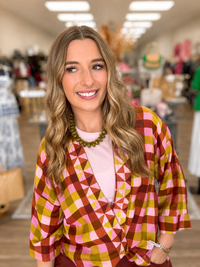 The Madison top - colorful kimono-style top features a vibrant pink, olive, mustard, and rust geometric plaid print, and wide sleeves
