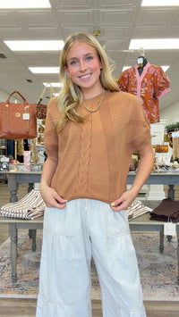 Caramel Comfort Sweater - warm caramel knit sweater featuring a relaxed fit, short sleeves, and beautiful mixed cable-knit and textured detailing
