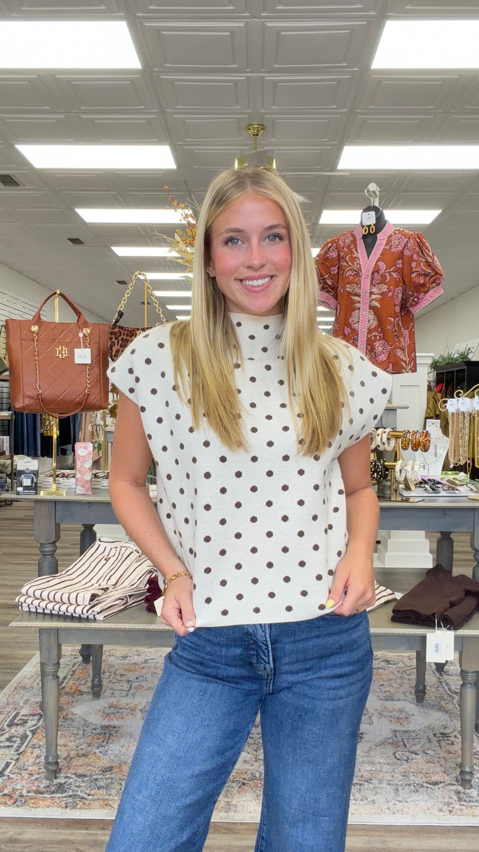 The Evie sweater - A cream knit short-sleeve sweater top with brown polka dots, featuring a high crew neckline, relaxed boxy fit, and lightweight sweater-knit construction. Entro
