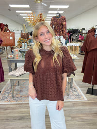 Sweet as Cocoa Blouse - Rich chocolate brown eyelet top featuring intricate crochet detailing, dramatic puff sleeves, and a feminine ruffled neckline.