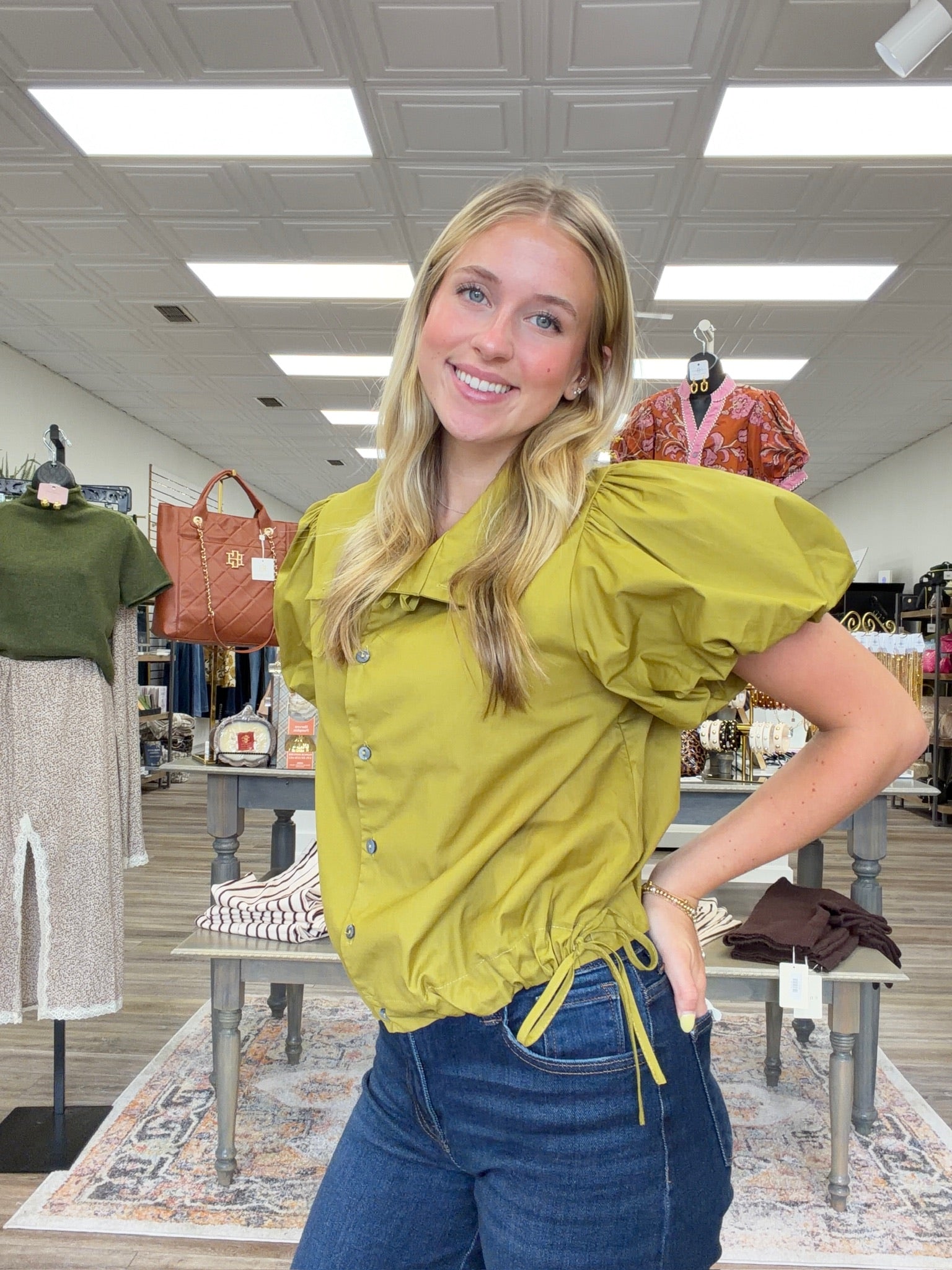 Autumn Olive Top - olive green button-front top featuring an oversized statement collar, playful puff sleeves, and adjustable side-tie details.