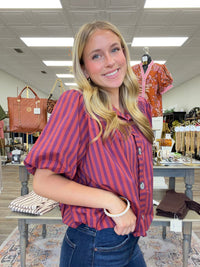 Plum Perfect Blouse - Bold berry and plum striped blouse featuring statement puff sleeves, a structured collar, and oversized button-front detailing