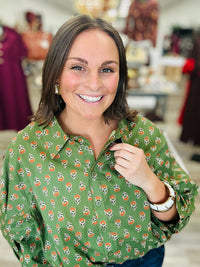 Fall in the Fields Blouse – Olive green blouse featuring a charming orange floral print, classic collar, button-front detailing, and flowy sleeves.