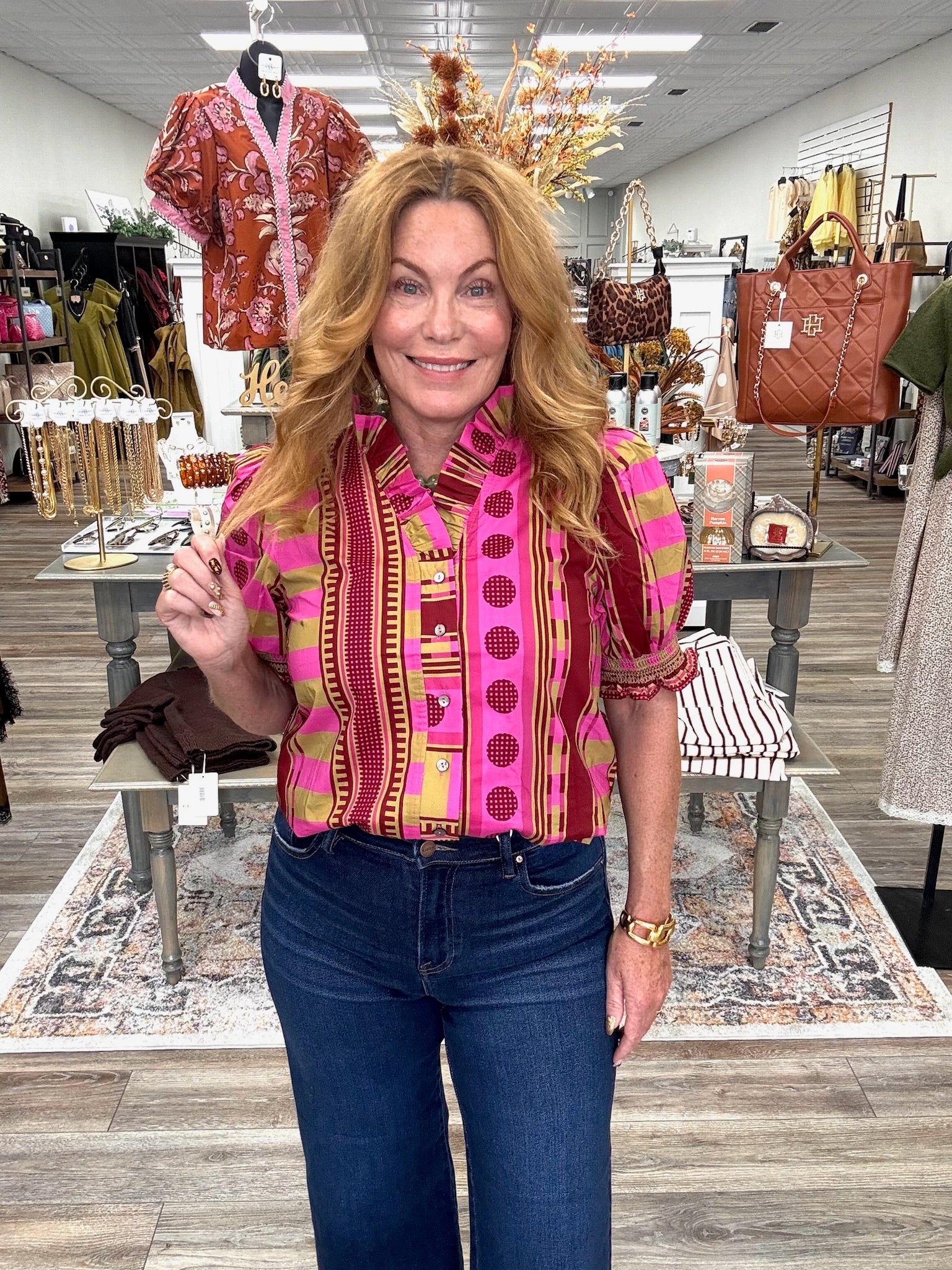 Pink Pumpkin Spice Top - Vibrant pink and olive printed top featuring a playful mix of stripes and geometric patterns, statement puff sleeves, and feminine ruffle detailing.