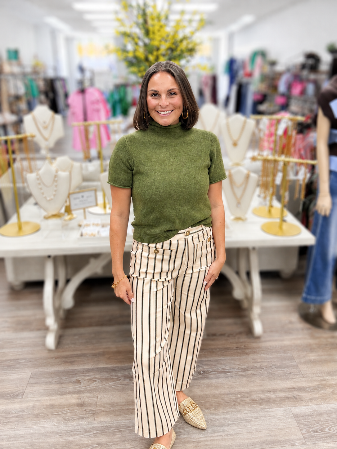 Olive Grove Luxe Knit Top. Ultra-soft moss green knit top, featuring a relaxed mock neckline, short sleeves, and a flattering easy-fit silhouette. -Entro