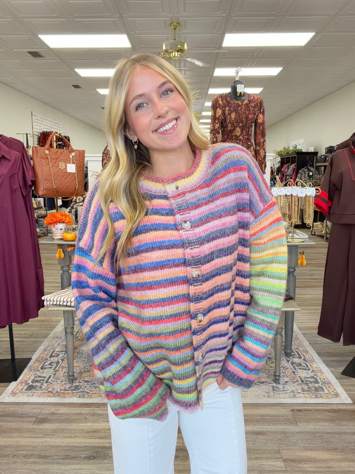Sunset sorbet cardigan - soft, colorful rainbow-striped knit cardigan featuring a cozy relaxed fit, crew neckline, and button-front closure.