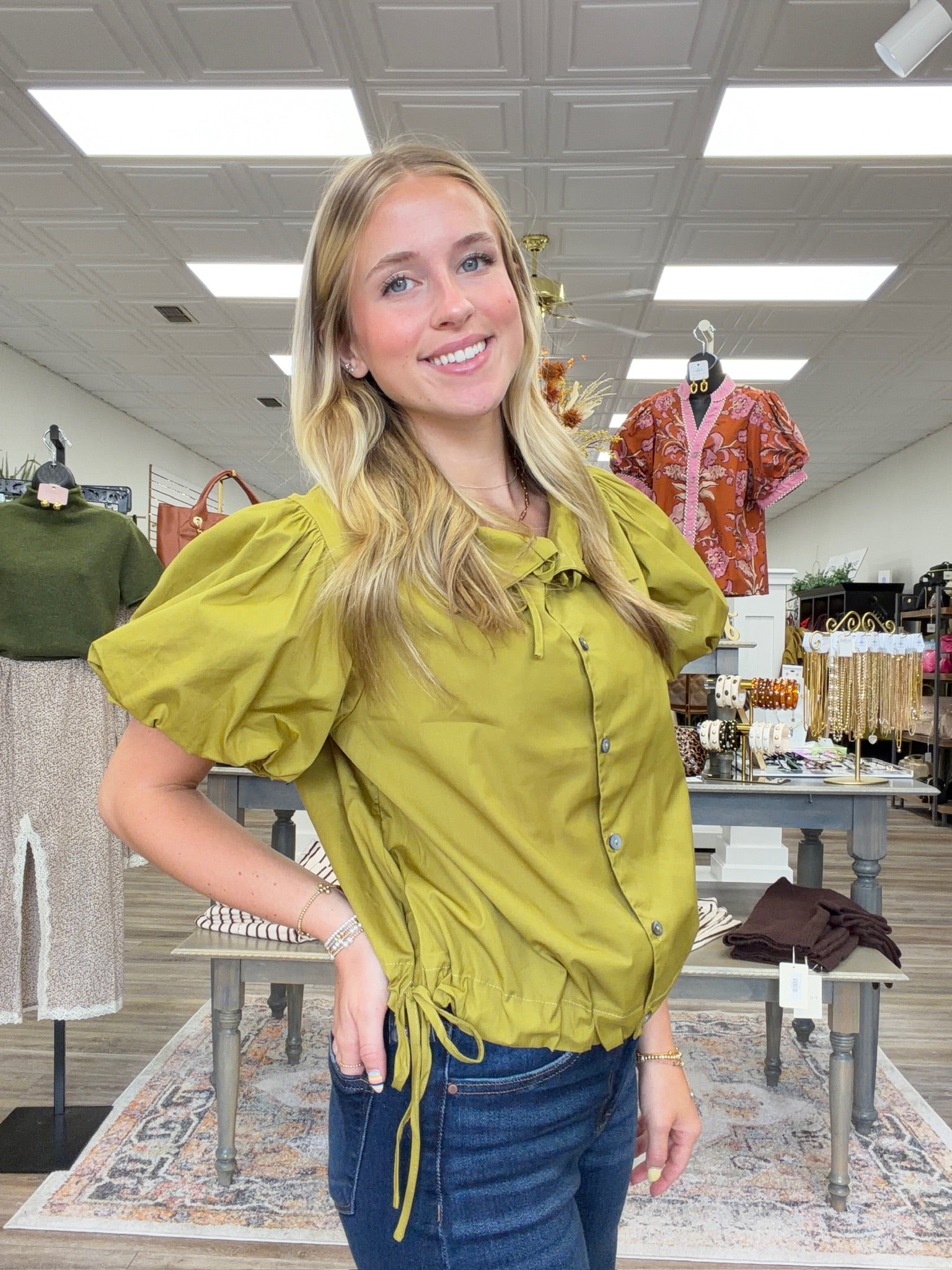 Autumn Olive Top - olive green button-front top featuring an oversized statement collar, playful puff sleeves, and adjustable side-tie details.
