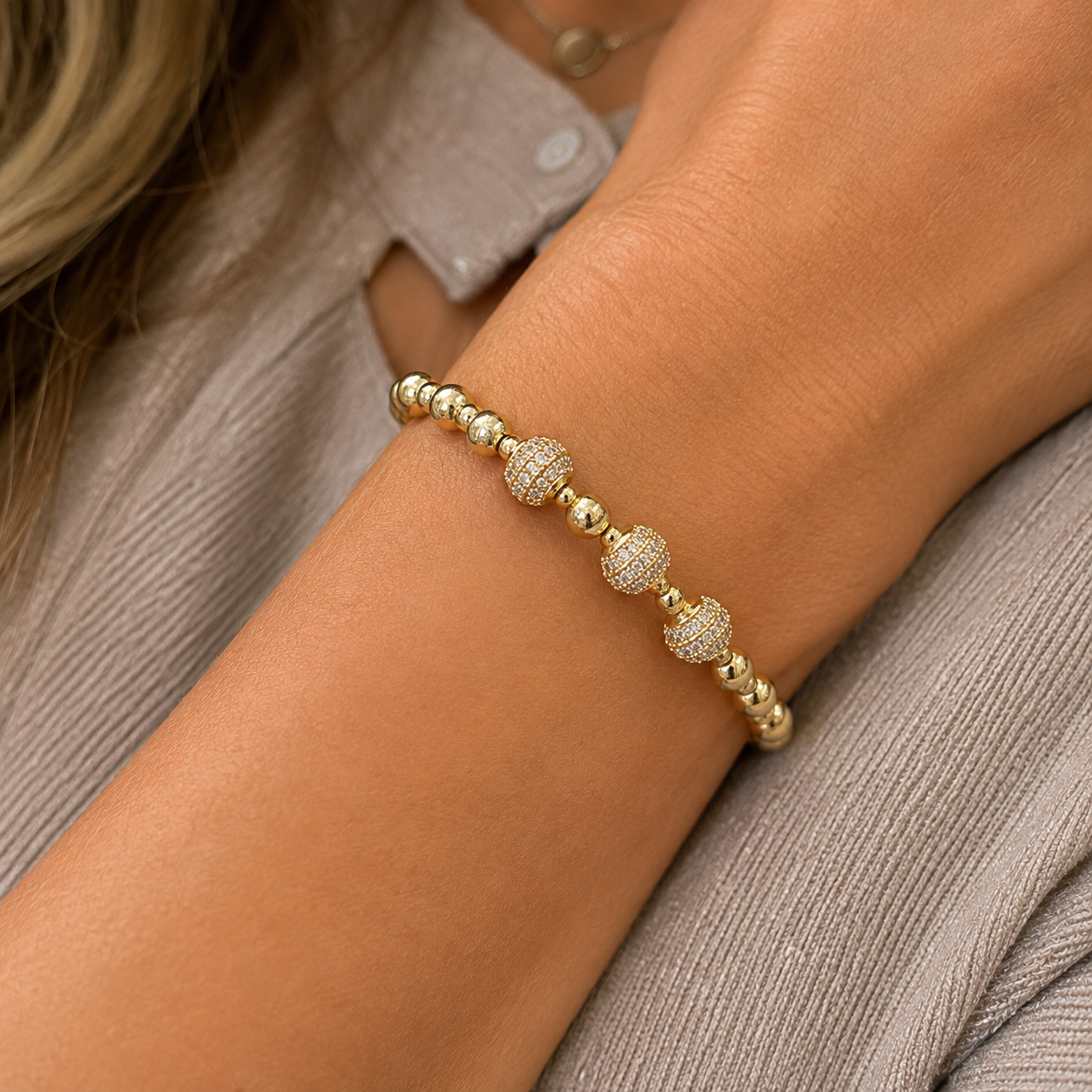 Stretch beaded stackable gold bracelet with cz accent beads - steel 18 karat gold overlay