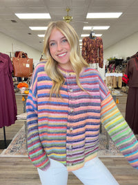 Sunset sorbet cardigan - soft, colorful rainbow-striped knit cardigan featuring a cozy relaxed fit, crew neckline, and button-front closure.