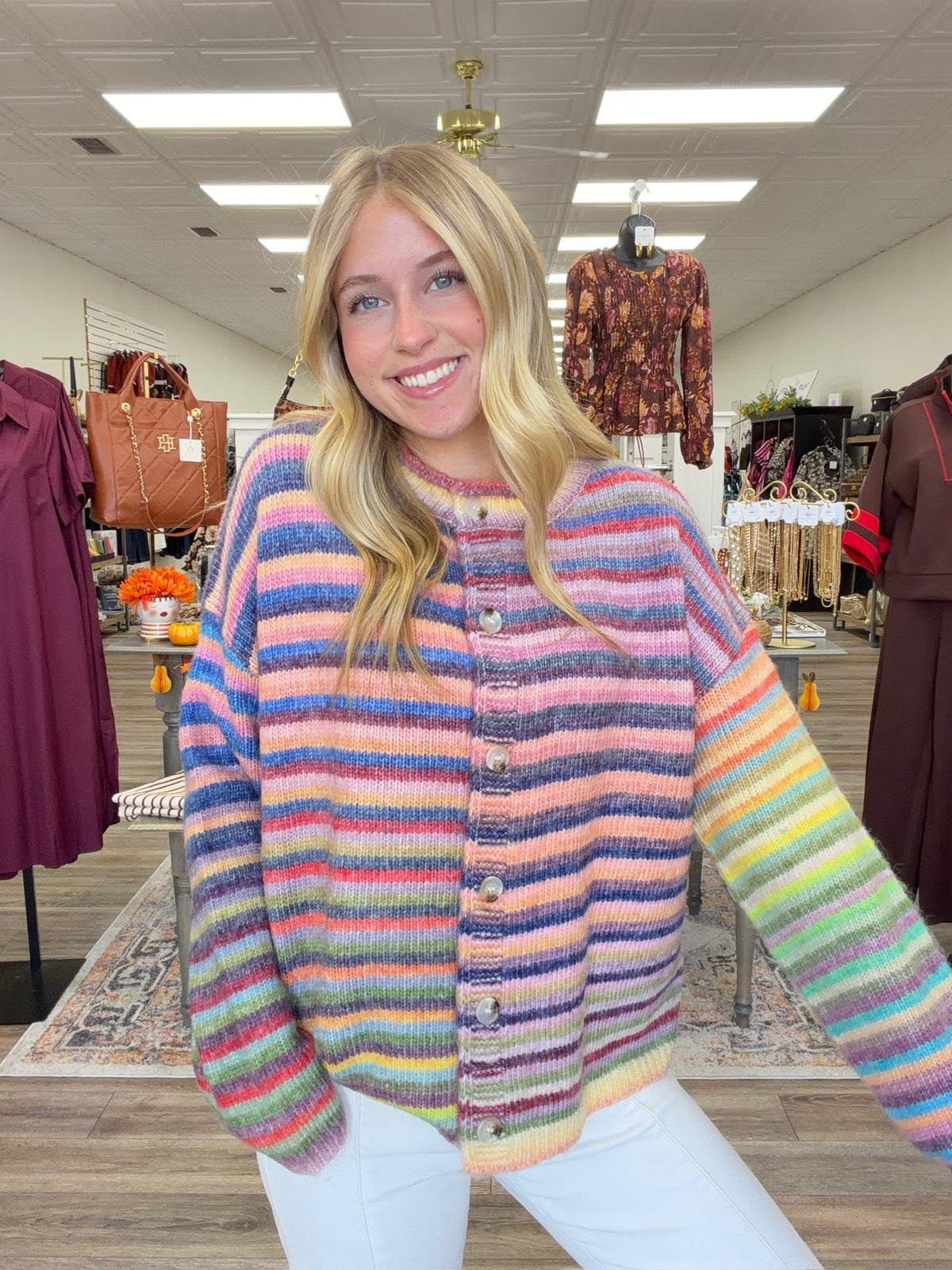 Sunset sorbet cardigan - soft, colorful rainbow-striped knit cardigan featuring a cozy relaxed fit, crew neckline, and button-front closure.