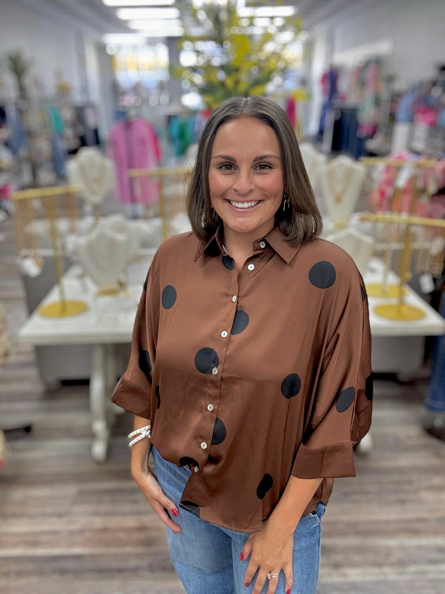 Pretty in polka dot blouse - brown satin button-up top with oversized black polka dots, featuring a classic collar, three-quarter sleeves, and a relaxed fit