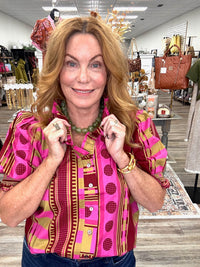 Pink Pumpkin Spice Top - Vibrant pink and olive printed top featuring a playful mix of stripes and geometric patterns, statement puff sleeves, and feminine ruffle detailing.