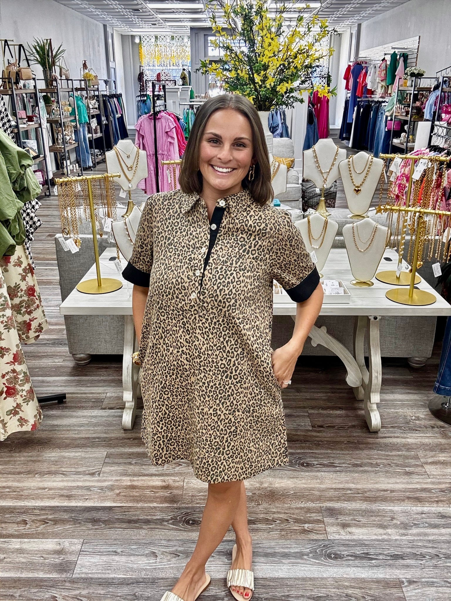 The Sadie dress - leopard print shirt dress, button-front placket, chest pocket, and contrasting black cuffed short sleeves. JODIFL style#G50881