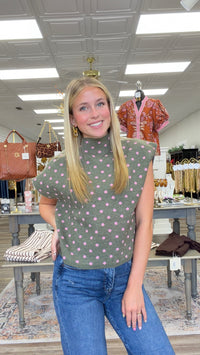 The Evie sweater - Olive knit short-sleeve sweater top with pink polka dots, featuring a high crew neckline, relaxed boxy fit, and lightweight sweater-knit construction. Entro