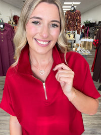 Crimson Cutie set – Bold red set featuring a flattering high-rise fit skort and a quarter zip top❤️