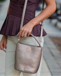 Caroline Hill -  Breyer Bucket Bag Bronze Short tubular handle for everyday carry; detachable crossbody strap for versatile styling