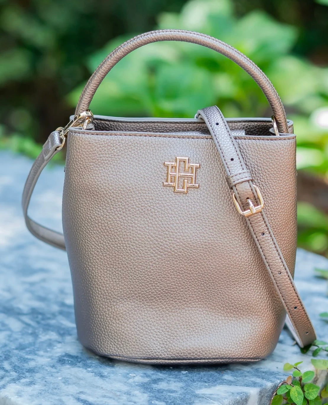 Caroline Hill -  Breyer Bucket Bag Bronze Short tubular handle for everyday carry; detachable crossbody strap for versatile styling
