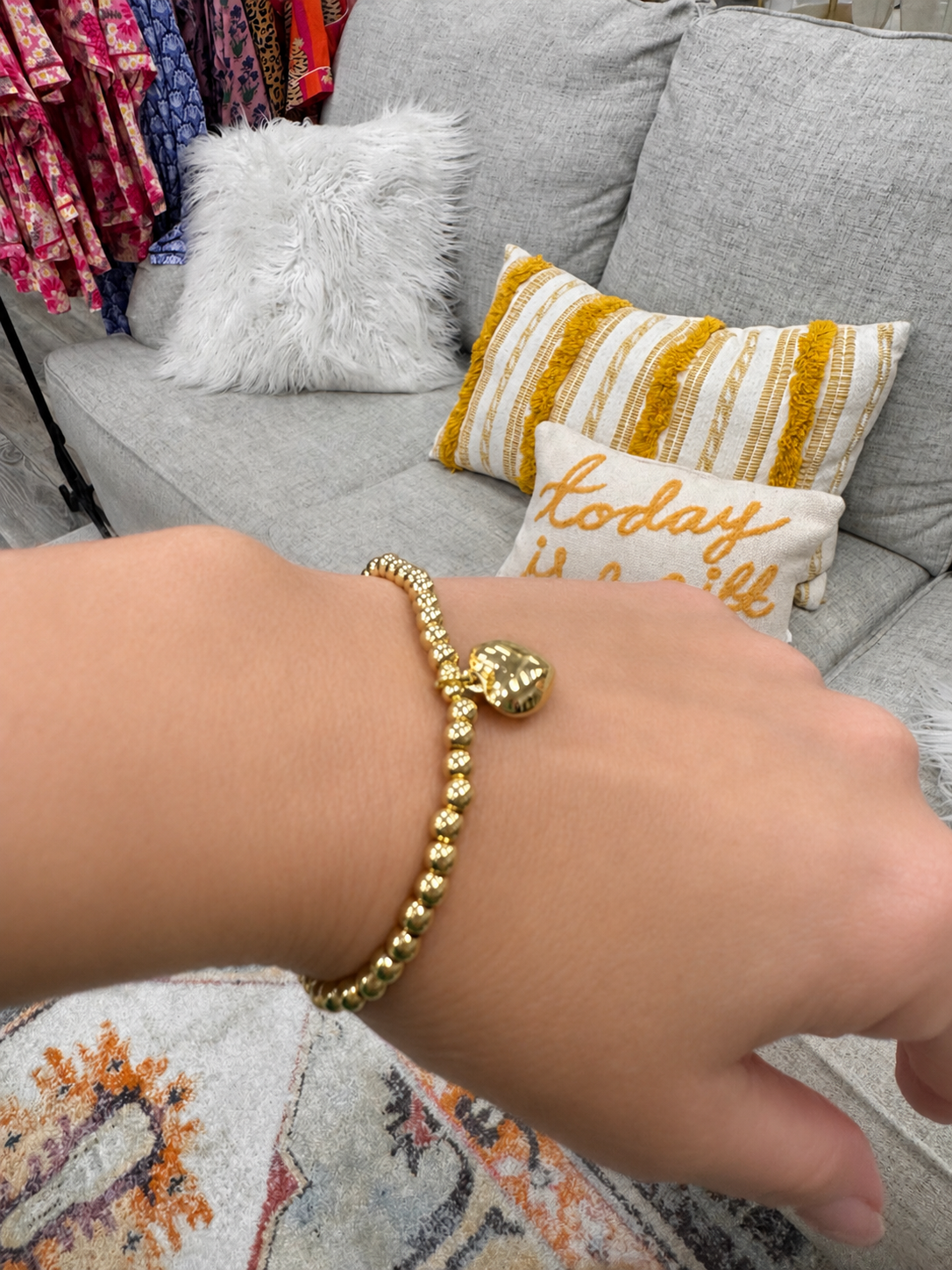 Stretch beaded bracelet with heart pendant accent- steel 18 karat gold overlay