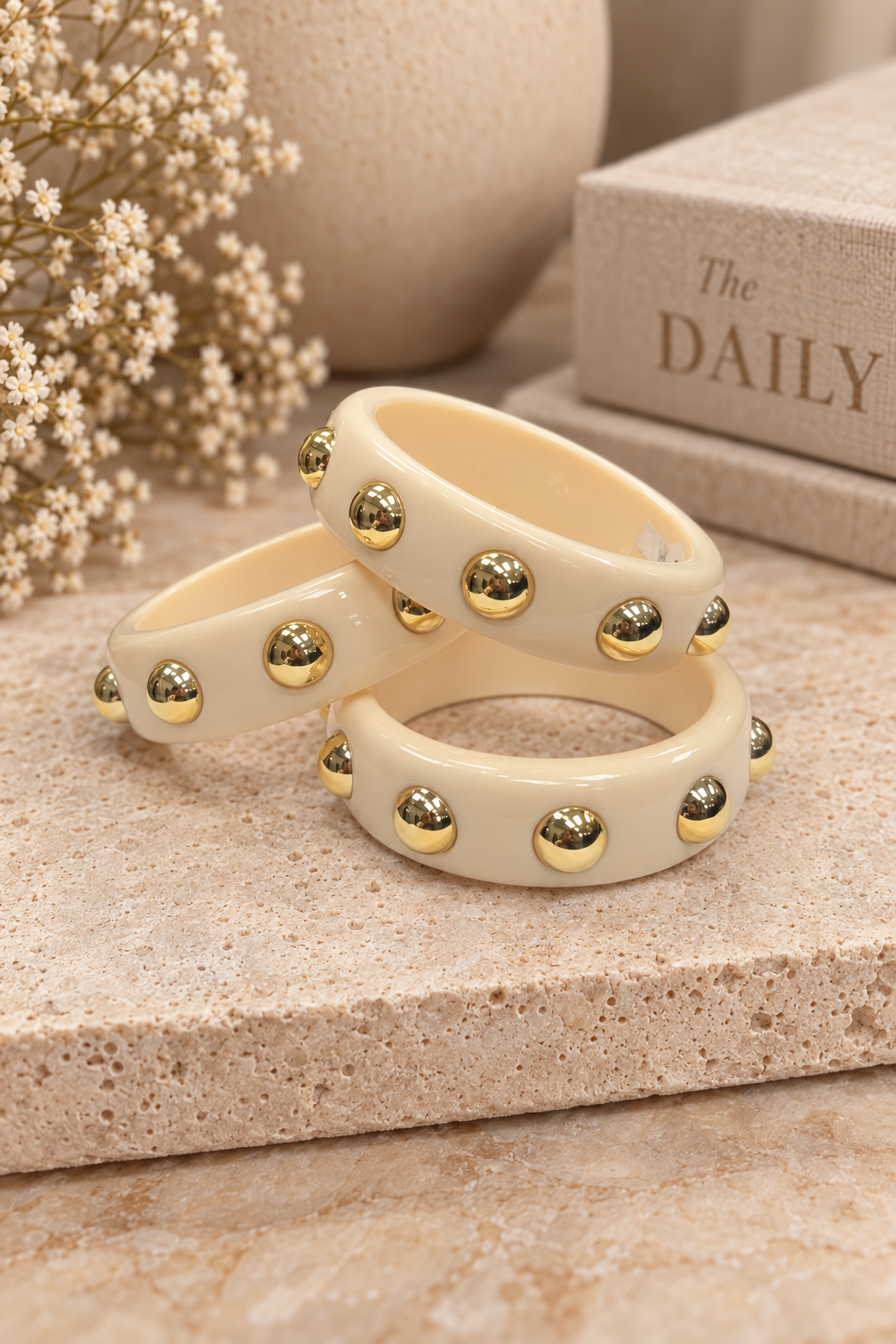 The Gilded Ivory acrylic ￼Bangle  -  Gold Tone Stud Accents (Sold Separately)